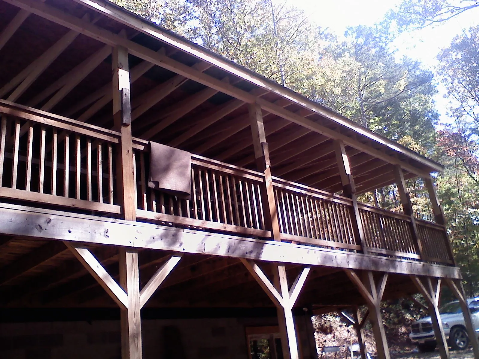 Timber framing under a new elevated porch and deck — Roof Leak Repair in Port Neches by Roofing Brothers
